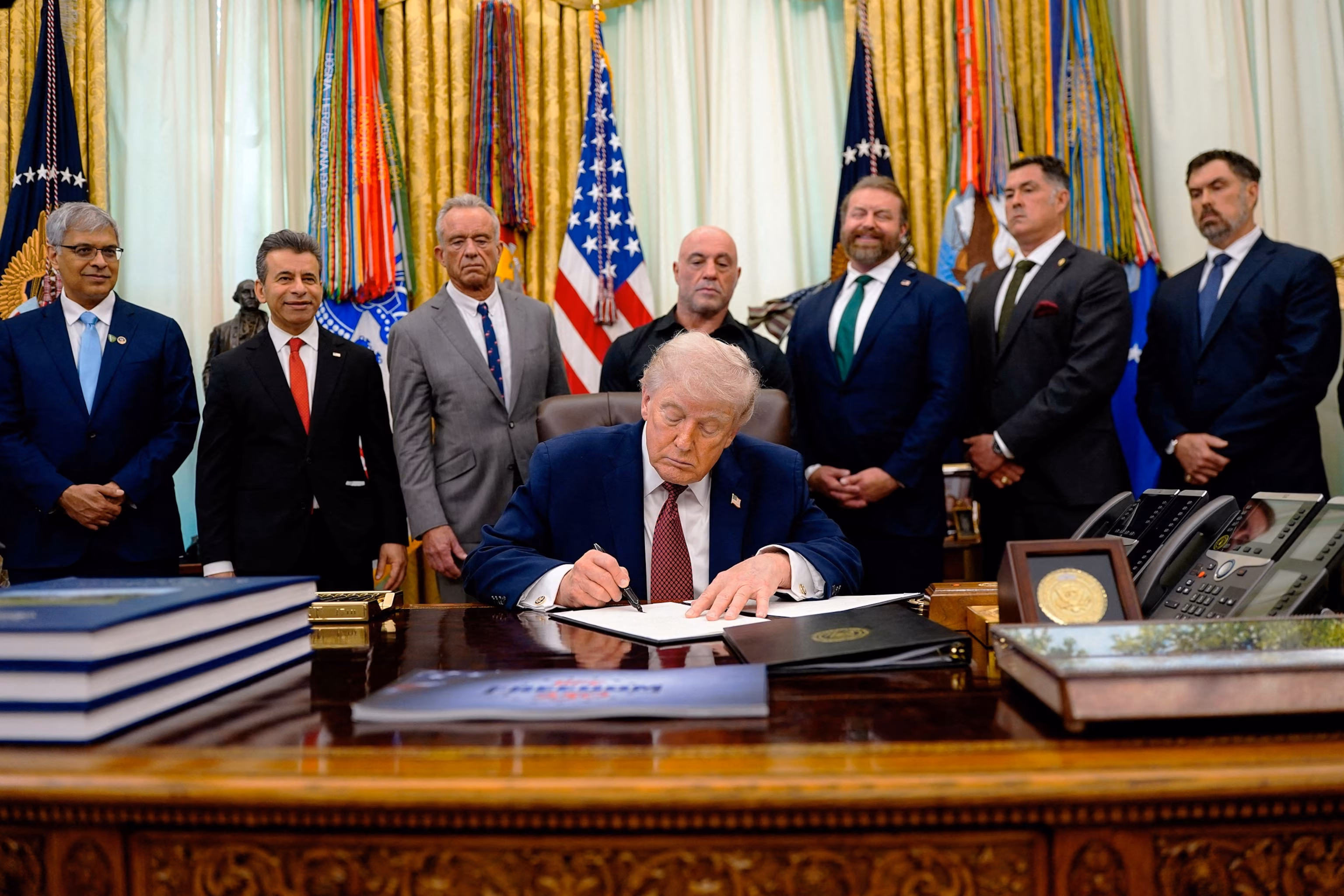 President Trump signing the executive order on psychedelic treatments